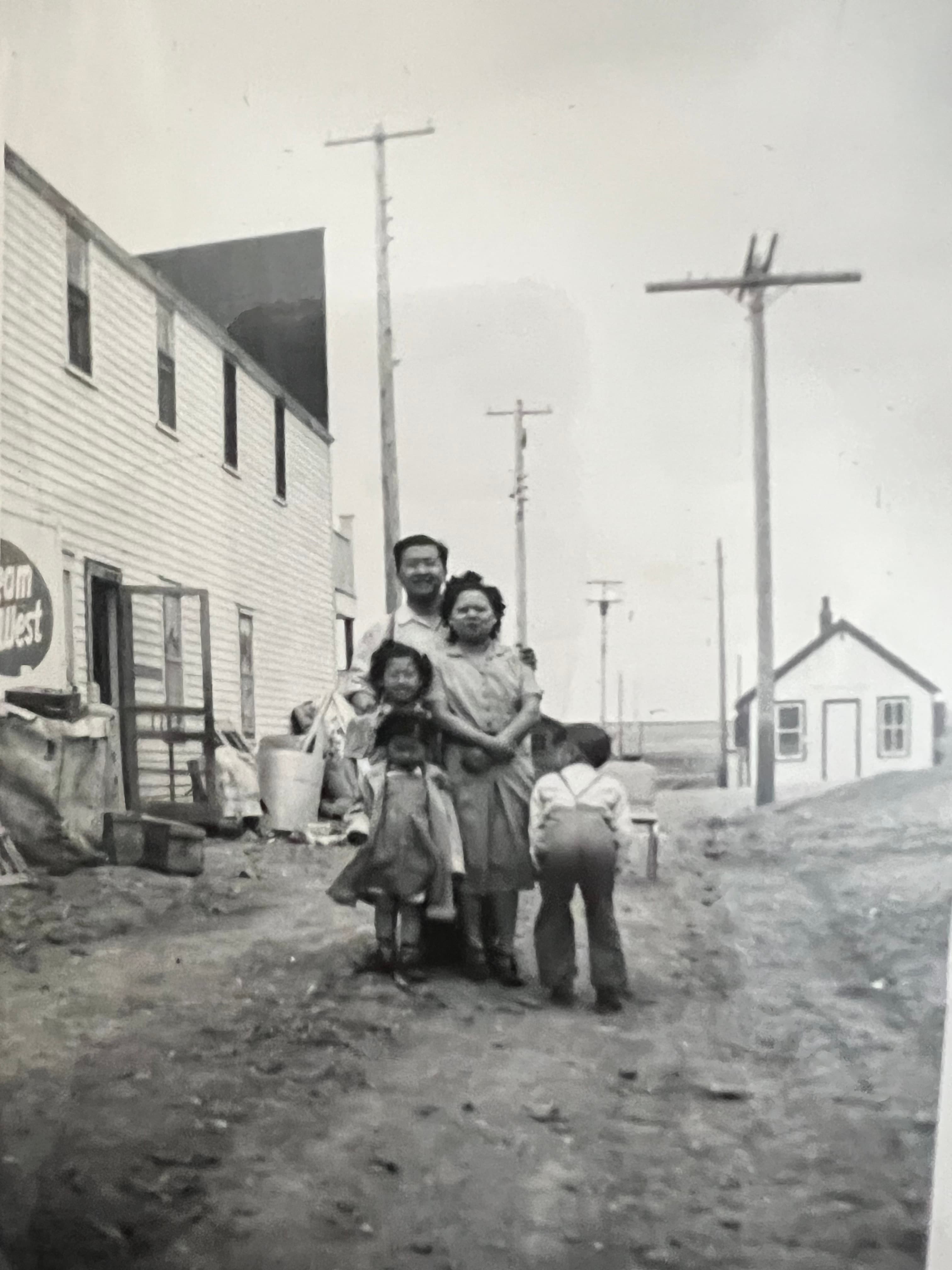 alternate photo of the Lake Alma building with Art, his wife and 3 of their children